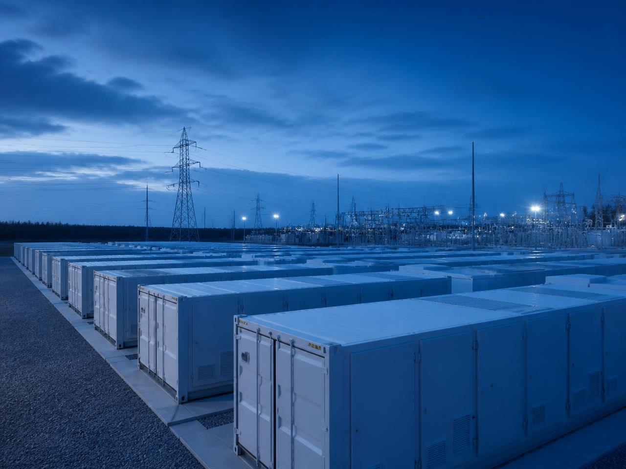 Grid-scale battery energy storage containers beside a substation